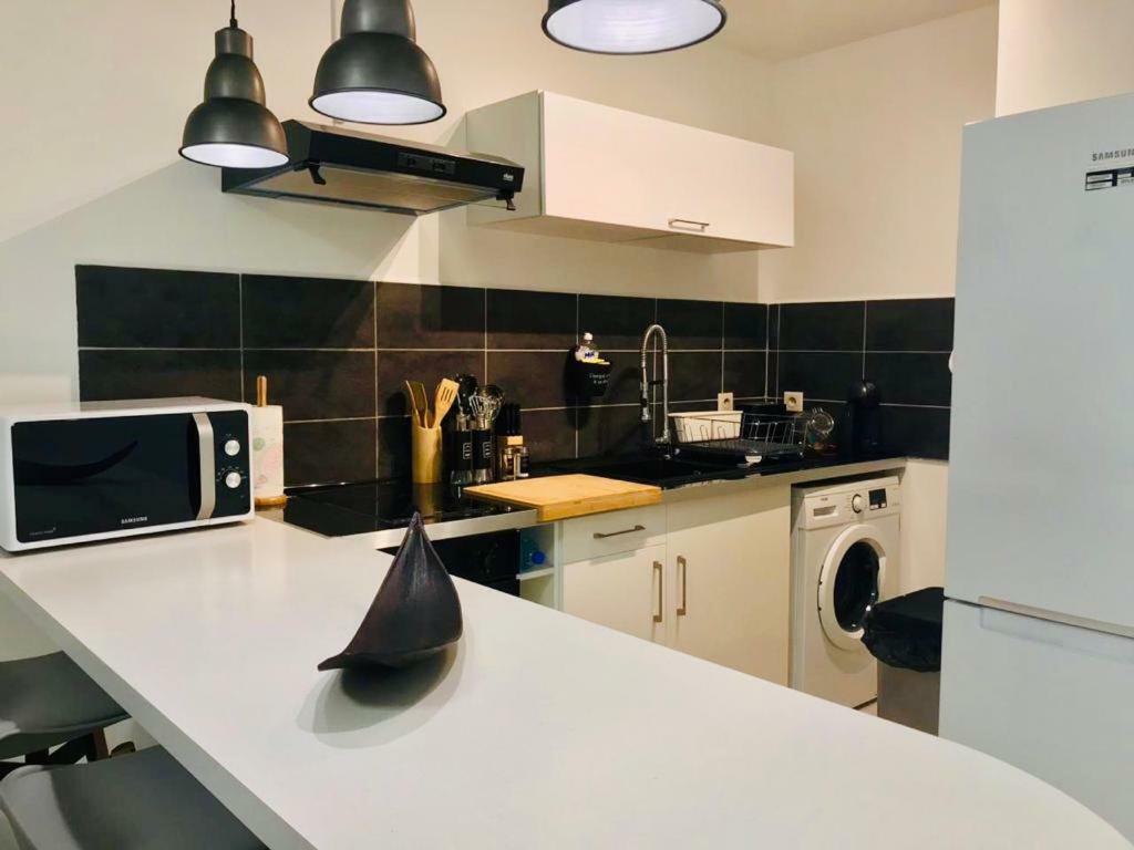 Appartement Au Bord De Mer Le Moule Bagian luar foto